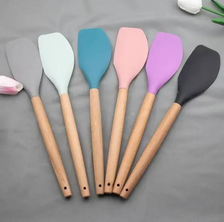 Silicone Heat Resistant Spone With Wooden Handle each