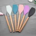 Silicone Heat Resistant Spone With Wooden Handle each