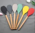 Silicone Heat Resistant Spone With Wooden Handle each