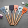 Silicone Heat Resistant Spone With Wooden Handle each